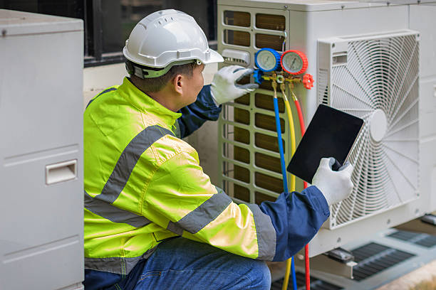 Professional Hvac technician working in Corona, NY